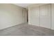 Comfortable bedroom with closet and neutral carpet provides a cozy and organized living space at 2433 E 90Th Ave, Thornton, CO 80229