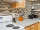 Charming kitchen showcasing wooden cabinetry, modern appliances, and ample counter space for culinary enthusiasts at 2433 E 90Th Ave, Thornton, CO 80229