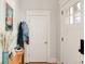 Bright entryway featuring classic trim and a decorative door with sidelight window at 2445 N Franklin St, Denver, CO 80205
