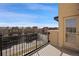 Balcony overlooking community streets, homes, and blue skies at 9225 Rockhurst St # A, Highlands Ranch, CO 80129