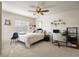 Bedroom featuring a neutral color palette, carpet flooring, and ample natural light at 9225 Rockhurst St # A, Highlands Ranch, CO 80129