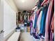 Organized walk-in closet with ample storage space, shelving, and room for clothes at 9225 Rockhurst St # A, Highlands Ranch, CO 80129