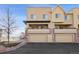 Modern townhome showcasing multiple balconies and attached garages at 9225 Rockhurst St # A, Highlands Ranch, CO 80129