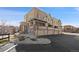 Townhome community showcasing manicured landscaping and exterior architecture at 9225 Rockhurst St # A, Highlands Ranch, CO 80129