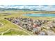 Lovely home with beautiful lake views and lush green landscape in the background at 17280 W 70Th Ave, Arvada, CO 80007