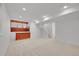 Finished basement featuring a wet bar, carpet and ample space, perfect for entertaining or relaxing at 17280 W 70Th Ave, Arvada, CO 80007