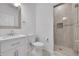 Stylish bathroom featuring a tiled shower, modern fixtures, and a sleek vanity for a refreshing experience at 17280 W 70Th Ave, Arvada, CO 80007