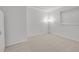 Cozy bedroom with a window, neutral paint, and carpet, creating a simple and inviting retreat at 17280 W 70Th Ave, Arvada, CO 80007