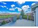 Relax on this spacious deck with views of the mountains and green meadows, perfect for entertaining guests at 17280 W 70Th Ave, Arvada, CO 80007