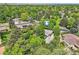 Aerial view of property showcasing lush surroundings, mature trees and neighborhood at 8600 W 2Nd Ave, Lakewood, CO 80226