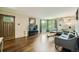 Bright living room with hardwood floors, large windows, and comfortable seating at 8600 W 2Nd Ave, Lakewood, CO 80226