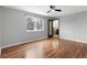 Bedroom with hardwood floors, and an ensuite bath at 3293 S Fairplay St, Aurora, CO 80014