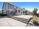 Beautiful backyard with patio, stone accents, and lush landscaping at 26385 E Canal Pl, Aurora, CO 80018