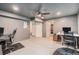 Finished basement featuring neutral paint, recessed lighting and space for multiple workstations at 26385 E Canal Pl, Aurora, CO 80018