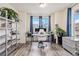 Cozy home office featuring hardwood floors and large windows at 26385 E Canal Pl, Aurora, CO 80018