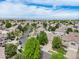 An aerial view of a suburban neighborhood with tree-lined streets and manicured lawns at 19481 E 50Th Pl, Denver, CO 80249