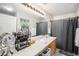 Functional bathroom with a large mirror, plenty of counter space, and storage for toiletries at 19481 E 50Th Pl, Denver, CO 80249
