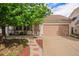 Charming single-Gathering home featuring a cozy front porch, two-car garage, and meticulous landscaping at 19481 E 50Th Pl, Denver, CO 80249