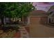 Charming single-Gathering home featuring a cozy front porch, two-car garage, and meticulous landscaping at 19481 E 50Th Pl, Denver, CO 80249