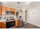 Modern kitchen with stainless steel appliances and ample counter space for cooking at 19481 E 50Th Pl, Denver, CO 80249