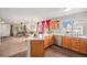 Open-concept living area with natural light, modern furniture, and an inviting atmosphere at 19481 E 50Th Pl, Denver, CO 80249