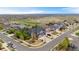 Aerial view of neighborhood with meticulously maintained lawns and landscaping at 15915 E Summit Fox Ave, Parker, CO 80134