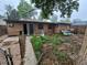View of the backyard with access to the house and storage shed at 1078 Elmira St, Aurora, CO 80010