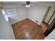 This bedroom features hardwood floors and natural light at 1078 Elmira St, Aurora, CO 80010