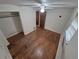 This bedroom has hardwood floors, a ceiling fan, and closet at 1078 Elmira St, Aurora, CO 80010