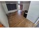 Bright living room with hardwood floors, ample space, and potential for creating a welcoming atmosphere at 1078 Elmira St, Aurora, CO 80010