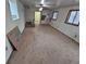 An empty room featuring carpet flooring, windows, and light walls at 1078 Elmira St, Aurora, CO 80010