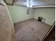 An empty room featuring light walls and carpet flooring at 1078 Elmira St, Aurora, CO 80010