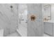 Elegant bathroom showcasing a walk-in shower and soaking tub with modern gold fixtures at 2141 Fountain Cir, Erie, CO 80516