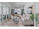 Comfortable home office featuring a desk, sofa, stylish decor, and natural light, ideal for remote work or relaxation at 2141 Fountain Cir, Erie, CO 80516