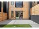 Backyard view featuring artificial turf and concrete patio at 1262 N Stuart St # 2, Denver, CO 80204