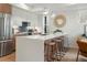Modern kitchen featuring a quartz countertop island, stainless steel appliances, and pendant lighting at 1262 N Stuart St # 2, Denver, CO 80204