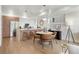Bright, modern kitchen featuring a large island, stainless steel appliances, and stylish pendant lighting at 1262 N Stuart St # 2, Denver, CO 80204