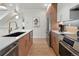Spacious kitchen featuring modern cabinetry, stainless steel appliances, and ample counter space at 1262 N Stuart St # 2, Denver, CO 80204