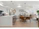 Bright, modern kitchen featuring a large island, pendant lighting, and stainless steel appliances at 1262 N Stuart St # 2, Denver, CO 80204