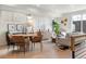 Open-concept living area with a dining table, comfortable seating, and stylish decor at 1262 N Stuart St # 2, Denver, CO 80204