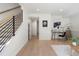 Bright living room with light wood floors and modern staircase at 1262 N Stuart St # 2, Denver, CO 80204