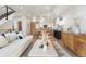 Stylish living room featuring hardwood floors, modern furniture, and an open floor plan to the kitchen at 1262 N Stuart St # 2, Denver, CO 80204