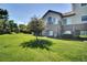 Backyard has well-maintained lawn with lush greenery, providing a serene outdoor space at 3325 W 111Th Loop # C, Westminster, CO 80031