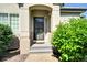 Charming home entrance with decorative door and manicured landscaping for welcoming curb appeal at 3325 W 111Th Loop # C, Westminster, CO 80031