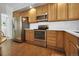 Well-equipped kitchen with stainless steel appliances and wooden cabinets at 3325 W 111Th Loop # C, Westminster, CO 80031