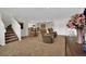 Inviting living room with comfortable recliners, perfect for relaxing and entertaining guests at 3325 W 111Th Loop # C, Westminster, CO 80031