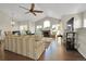 Bright living room with vaulted ceilings, a fireplace, and hardwood floors at 3325 W 111Th Loop # C, Westminster, CO 80031