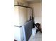 Storage area featuring plastic cabinets, mattress, paint bucket, and vacuum cleaner at 933 Skeel St, Brighton, CO 80601