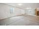 Unfinished basement ready for customization, featuring a large open space and natural light from basement windows at 16633 W 93Rd Way, Arvada, CO 80007