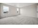 A bright bedroom featuring neutral walls and carpet at 16633 W 93Rd Way, Arvada, CO 80007